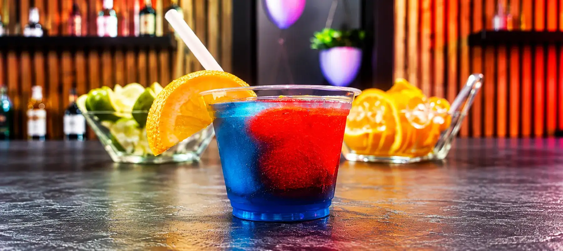 Vibrant Red and Blue Slushy Cocktail
